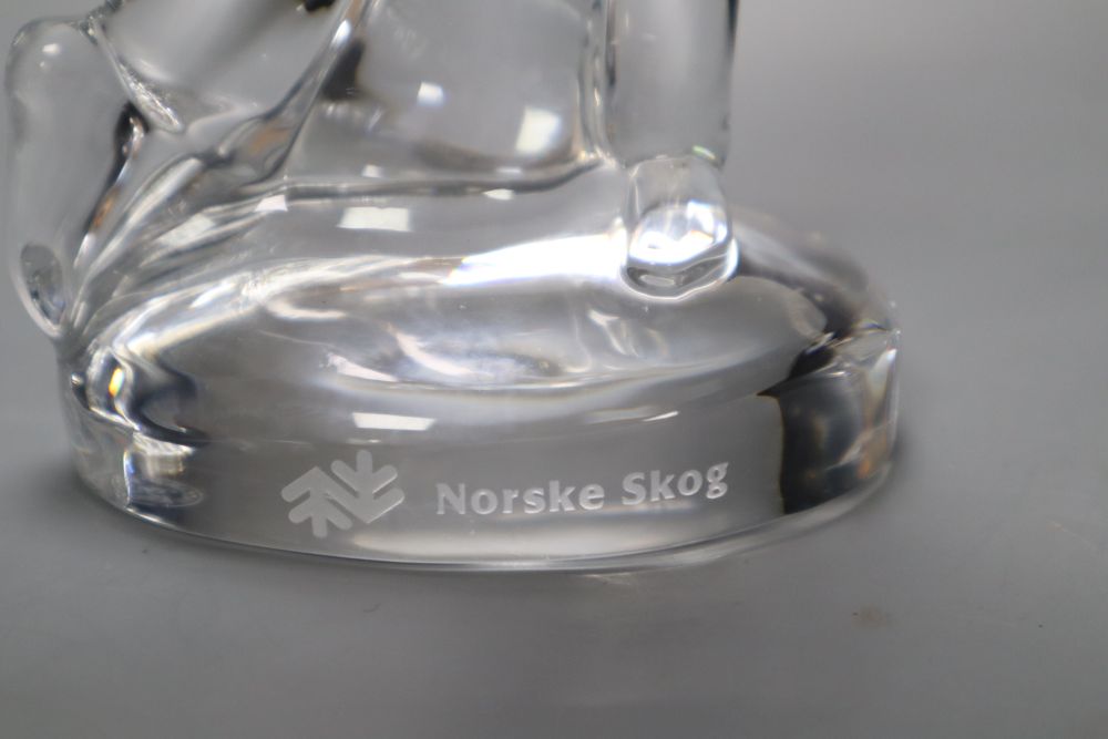 A Baccarat glass model of a golfer, inscribed Norske Skog, 24cm